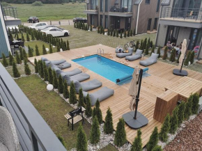 Apartamentai prie jūros
